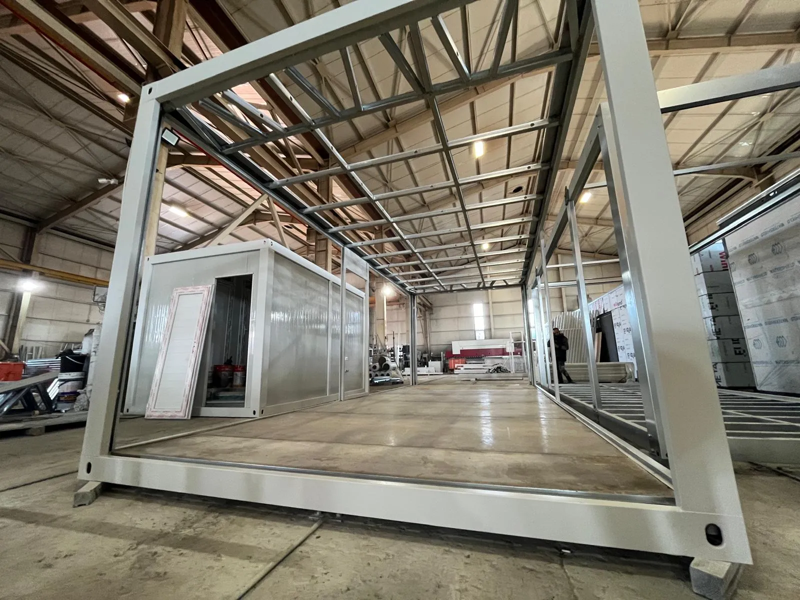 Interior view of metal framing during flat pack house assembly services process.