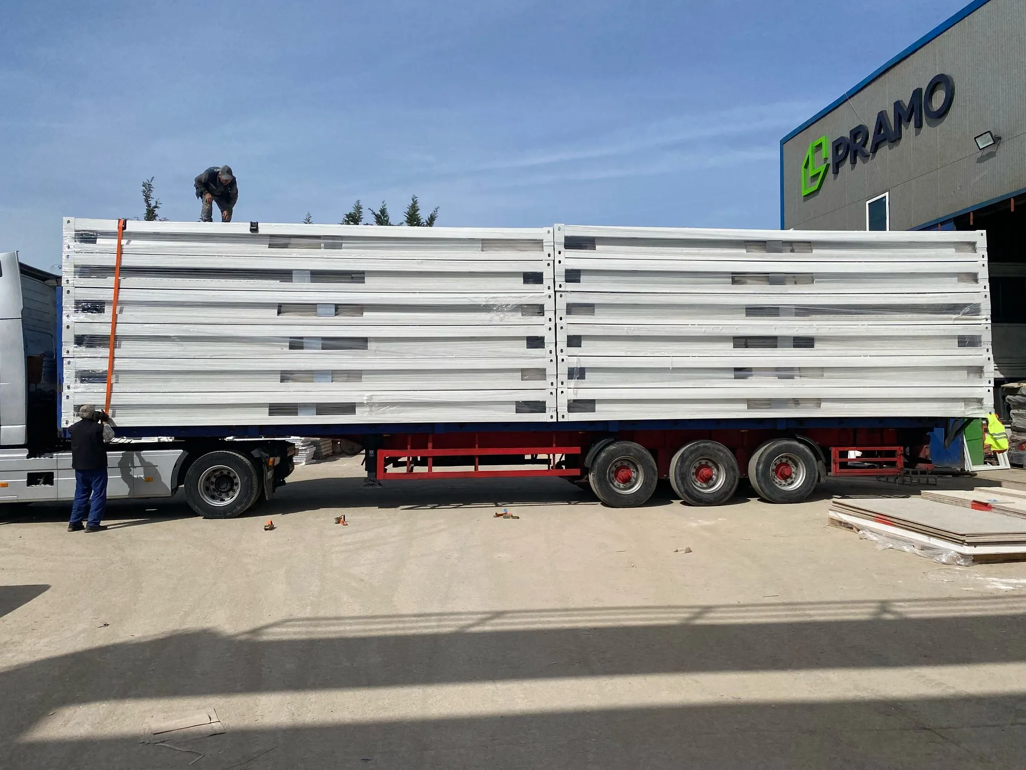 Flat pack house assembly services with precision metal framing and quality materials.